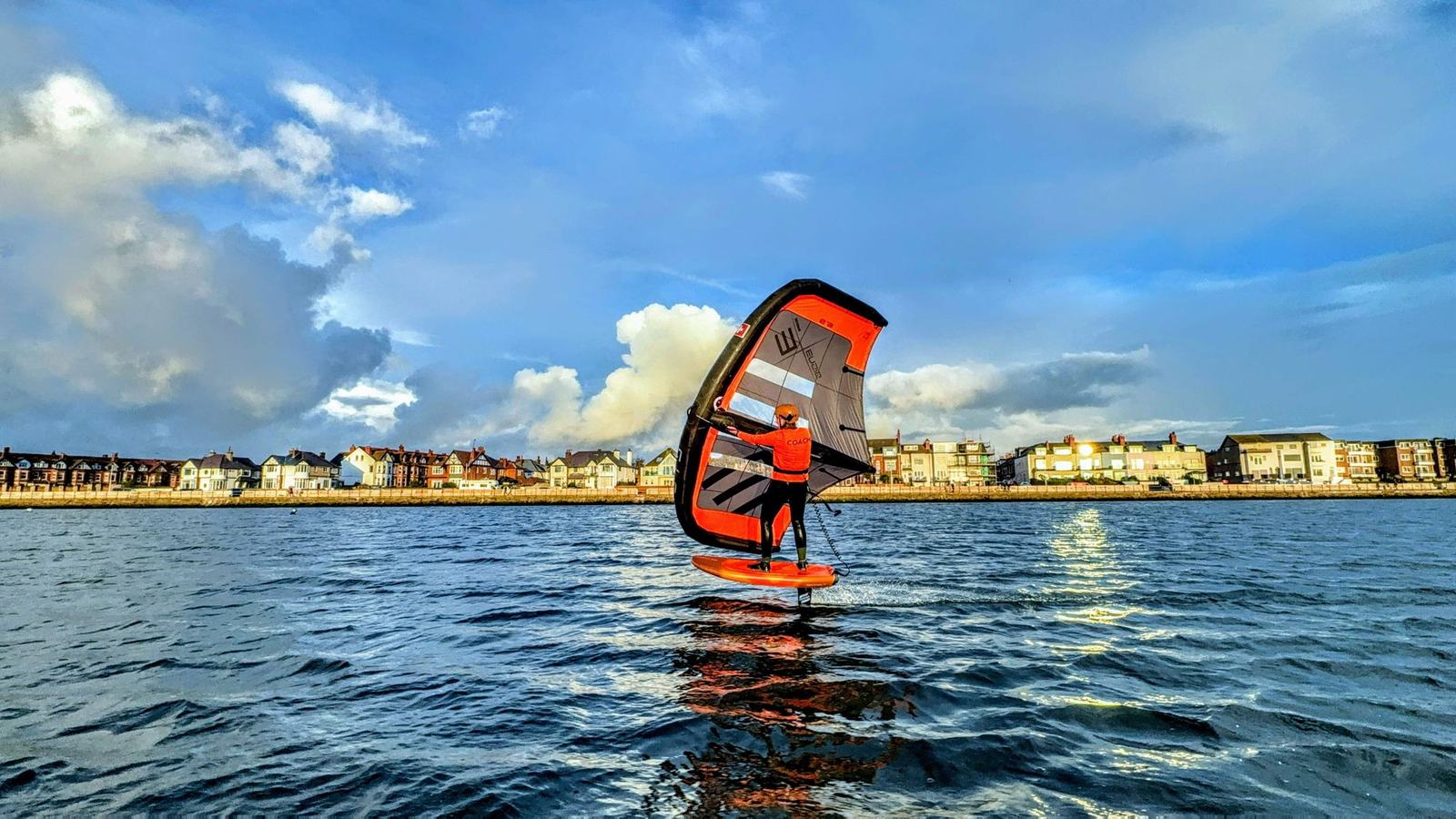 Wingfoil lesson on West Kirby Marine Lake, Wirral